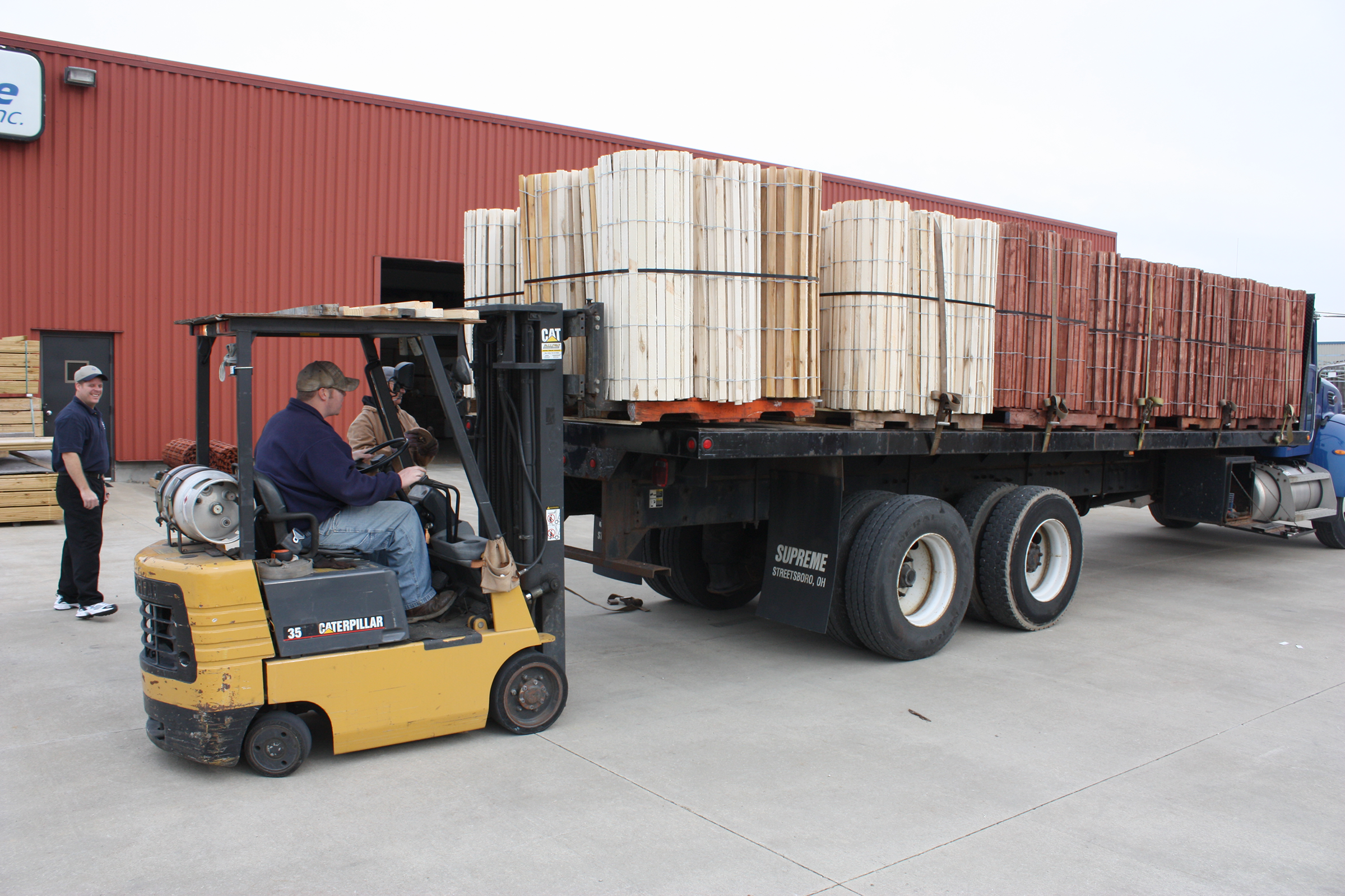 Truckloads of Wooden Sand and Snow Fence